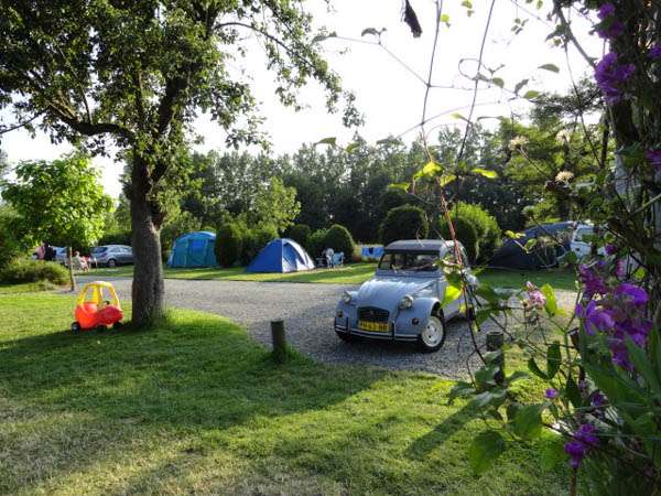 Family friendly campsite-tents- parked blue 2CV